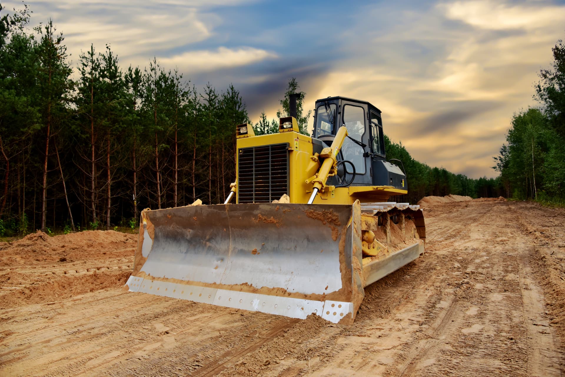 Land clearing crew removing brush and trees from a rural lot in Chipley, FL